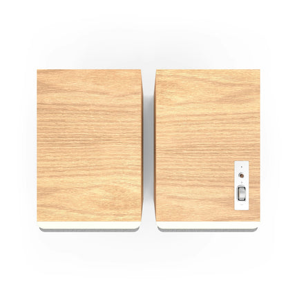 Pereche Klipsch The Nines II in finisaj Oak, vazute de sus, cu placa de comenzi