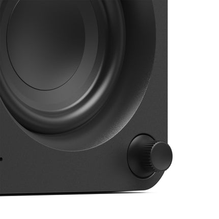 Boxe active Kanto Audio ORA negre, detaliu cu butonul de volum și wooferul