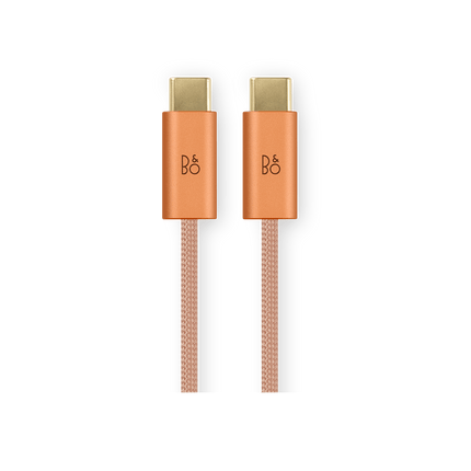 Bang & Olufsen Beoplay H100 în finisajul Sunset Apricot — cablu textil