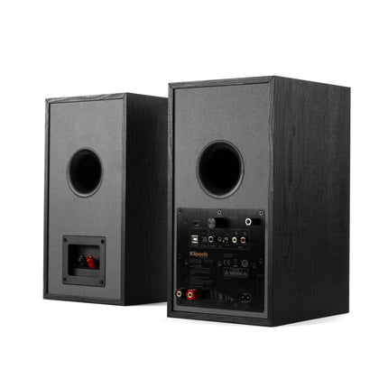 Klipsch R-51PM vazute din spate: incinta activa cu placa de amplificare si incinta pasiva cu borne simple