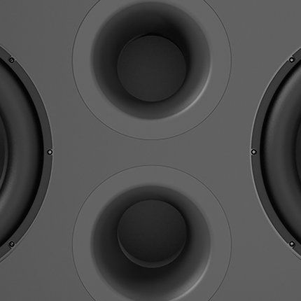 Detaliu al bafflei subwooferului JBL Synthesis SSW-1, cu cele doua porturi Slipstream evazate intre woofere