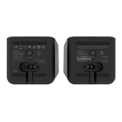 Partea inferioara a boxelor Klipsch Flexus SURR 200, cu butonul PAIR, mufa de alimentare si marcajele L si R